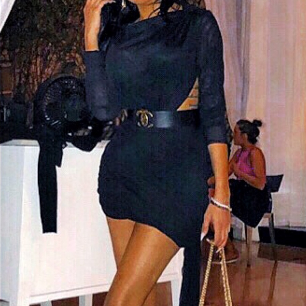 Lily Ghalichi black sheer dress with side train.